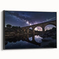 Framed canvas artwork depicting a scenic landscape bridge in black, showcasing intricate details and vibrant colors, perfect for home decor and aesthetic enhancement.
