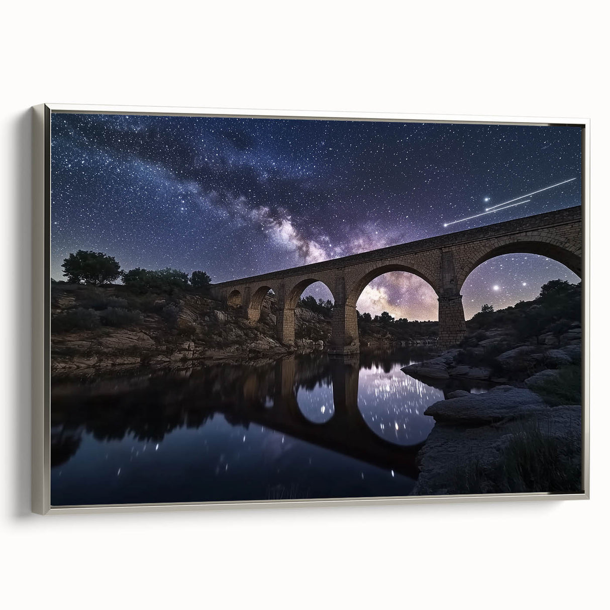 Framed canvas artwork showcasing a landscape view of a serene bridge, featuring a silver frame and vibrant colors, ideal for home decor and interior design enthusiasts.