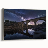 Framed canvas artwork showcasing a landscape view of a serene bridge, featuring a silver frame and vibrant colors, ideal for home decor and interior design enthusiasts.