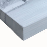 Close-up of abstract landscape wall art on stretched canvas, showcasing vibrant colors of blue and gold, ideal for modern home decor.