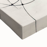 Close-up of a stretched canvas featuring abstract minimalist wall art in soft pastel colors, showcasing unique textures and fluid shapes, perfect for modern decor.