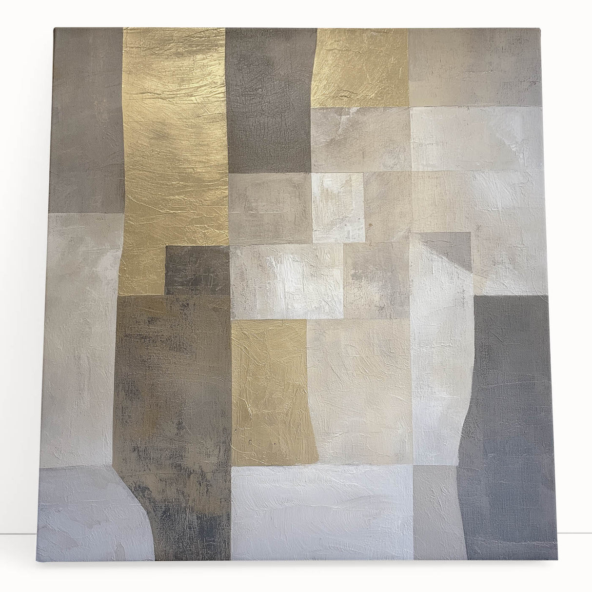 Abstract geometric canvas art showcasing vibrant colors and dynamic shapes, leaning against a wall, perfect for modern home decor or artistic spaces.