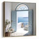Framed canvas wall art featuring a vintage poster of a Greek door architecture in silver and gold tones.
