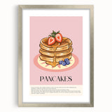 Textured art print of abstract pastries in vibrant orange and yellow tones, framed in silver, ideal for kitchen wall art.