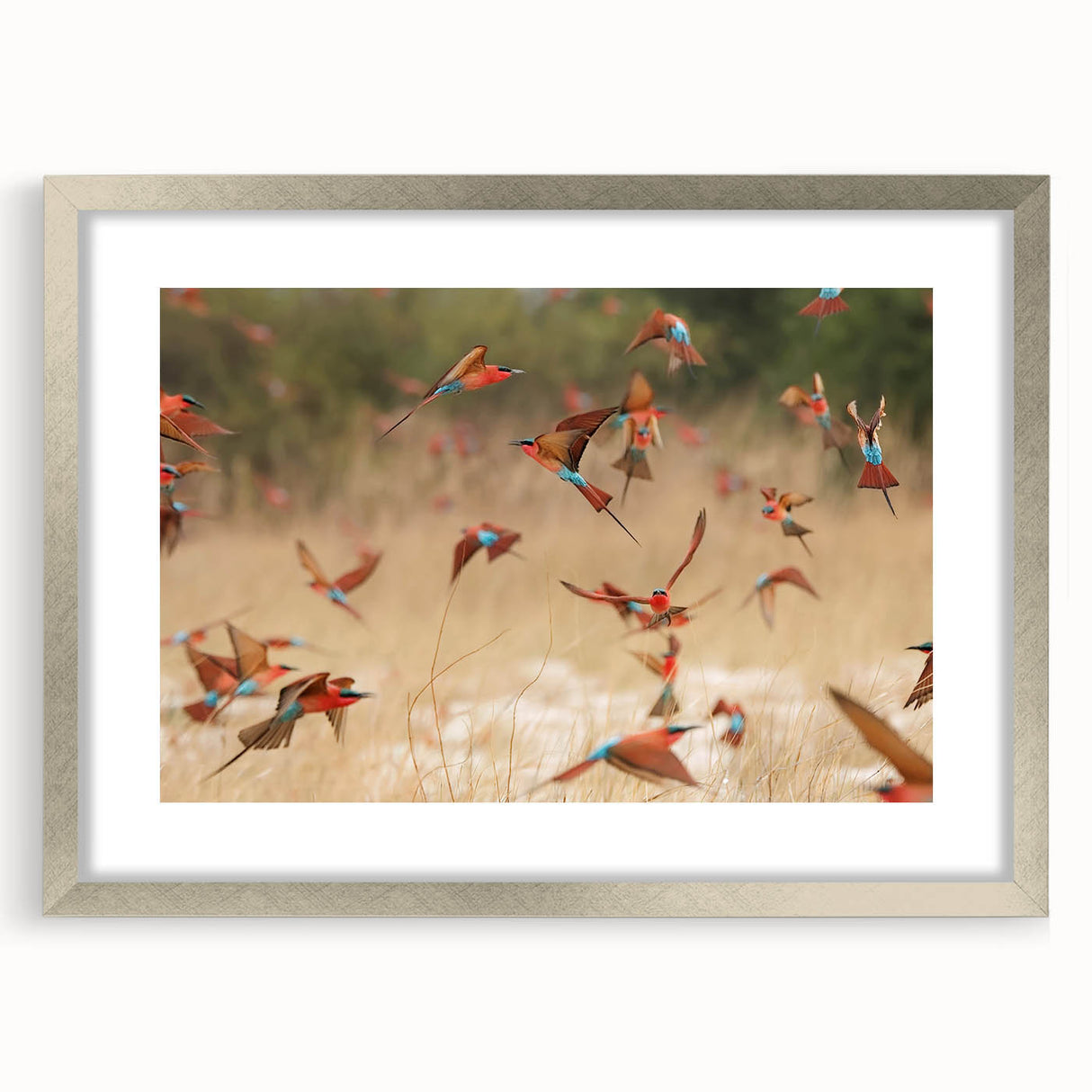Abstract art print of a Namibian landscape, featuring earthy orange and brown tones on a silver-framed canvas.