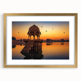 Extra large abstract art print depicting textured scenery of India in vibrant gold tones, framed with a mat.