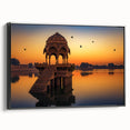 Black and white framed canvas featuring a vintage-style landscape painting of an Indian scenery.