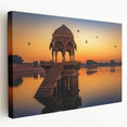 Large art depicting a serene Indian landscape on stretched canvas, featuring earthy green and brown tones.