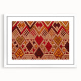 Abstract art print of a Laos scenery in muted earth tones on a framed white mat, suitable for dining room decor.