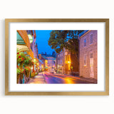 Extra large abstract art print featuring a textured scenery of Quebec, in muted earth tones, framed in gold.