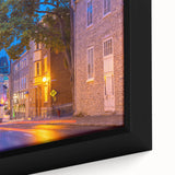 Extra large framed canvas depicting a textured Quebec scenery in black with colorful accents, ideal for living room decor.