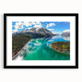 Extra large, colorful abstract art print of Yukon scenery on textured canvas, framed in black, suitable for a living room.