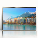 Large art print of a serene Austrian landscape in muted greens and blues, framed in silver acrylic.