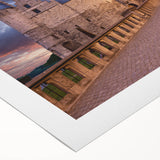 Art deco poster of a European cityscape in muted earth tones on rolled canvas, suitable for dining room decor.