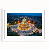 Textured art depicting an abstract European scenery in muted earth tones, printed on a white-framed mat.