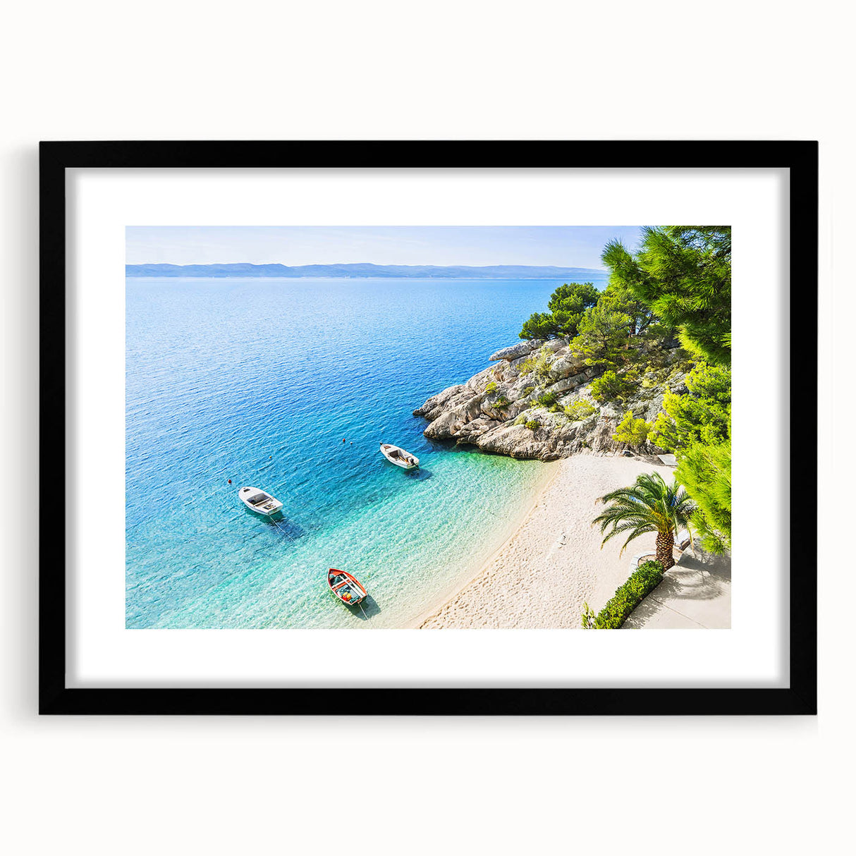 Colorful abstract art print of a European landscape in vibrant hues, framed with a black mat, ideal for living room decor.