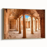 Framed canvas featuring a vintage landscape painting of a Cyprus scenery in muted gold and black tones.