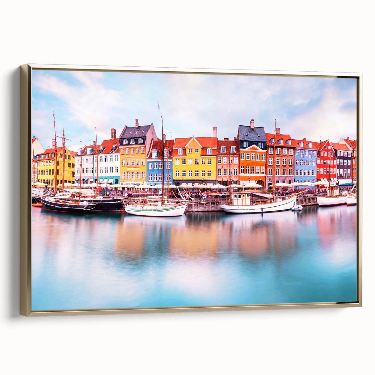 Framed canvas featuring a vintage-style landscape painting of a European scenery in Denmark with muted gold and black tones.