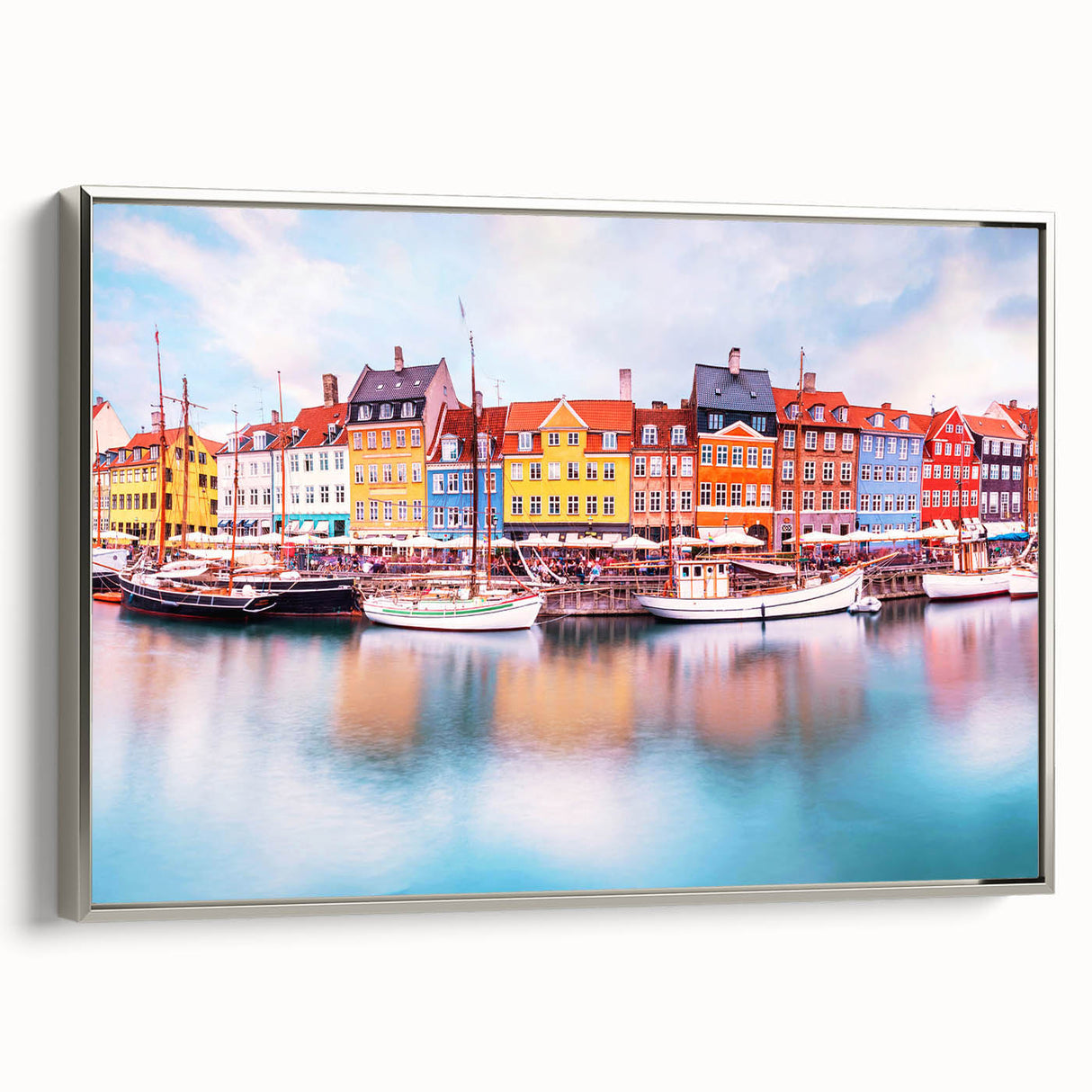 Framed canvas featuring a vintage-style landscape art painting of a Danish coastal scene, with muted pastel shades.