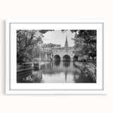 Textured art print of an abstract European scenery in muted earth tones, framed with a white mat, ideal for bedroom decor.