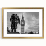 Abstract art print of London skyline in muted gold and black tones, framed with a gold mat, ideal for dining room decor.