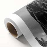 Art Deco poster of London scenery on rolled canvas, featuring muted earth tones, ideal for nursery wall art.