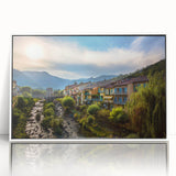 Mid-century modernist art depicting the French Alps in muted blue and white tones on a framed acrylic.