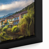 Extra large framed canvas of black wall art featuring a textured depiction of the French Alps in colorful hues.