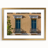 Abstract art print of a southern France landscape in muted earth tones on a framed canvas, suitable for dining room decor.