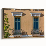 Framed canvas depicting a vintage-style landscape of Southern France in muted gold and black tones.