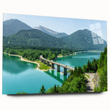 Large abstract wall art of the Bavarian landscape in muted green and blue hues on acrylic glass.