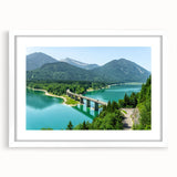 Textured art depicting an abstract Bavarian landscape in muted earth tones on a framed white mat, ideal for bedroom art.