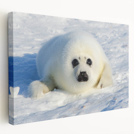 Side view of a stretched canvas depicting a serene Greenland landscape in muted green and blue tones.