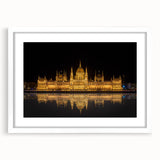 Textured art depicting an abstract European scenery in muted earth tones on a framed white mat, ideal for bedroom ambiance.