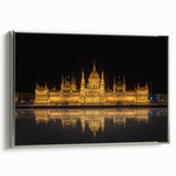 Framed canvas of a vintage European landscape painting, featuring muted colors and silver frame.