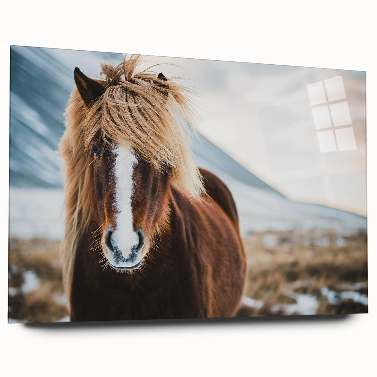 Large abstract wall art of Icelandic scenery in muted blue and gray tones on acrylic glass.