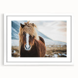 Textured abstract art print showcasing a muted palette of gray and blue Icelandic scenery, framed with a white mat.