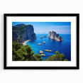 Colorful abstract art print of a European seaside, in vibrant shades, framed in black, ideal for living room decor.