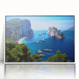 Mid-century modernist art depicting the Capri coastline in muted blues and greens, acrylic print framed in white.