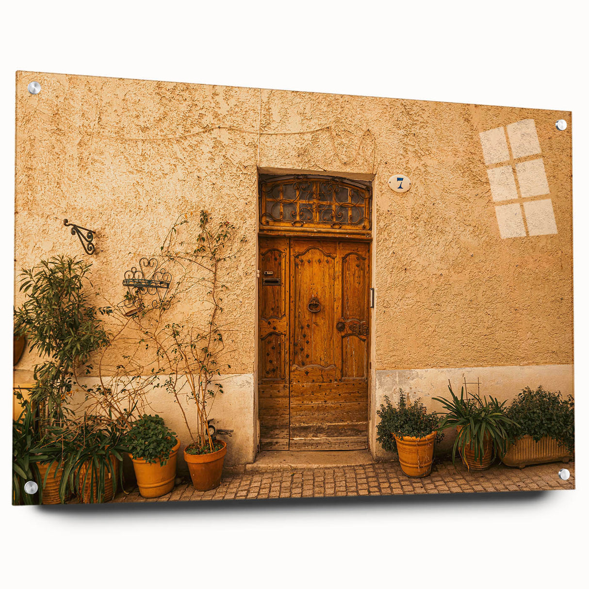 Acrylic print of a Tuscan landscape in soft earth tones, suitable for dining room decor.