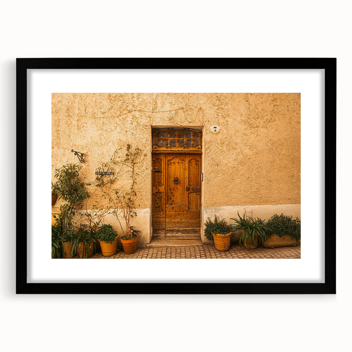 Extra large, textured abstract art print of Tuscan scenery in vibrant colors on a framed black mat.