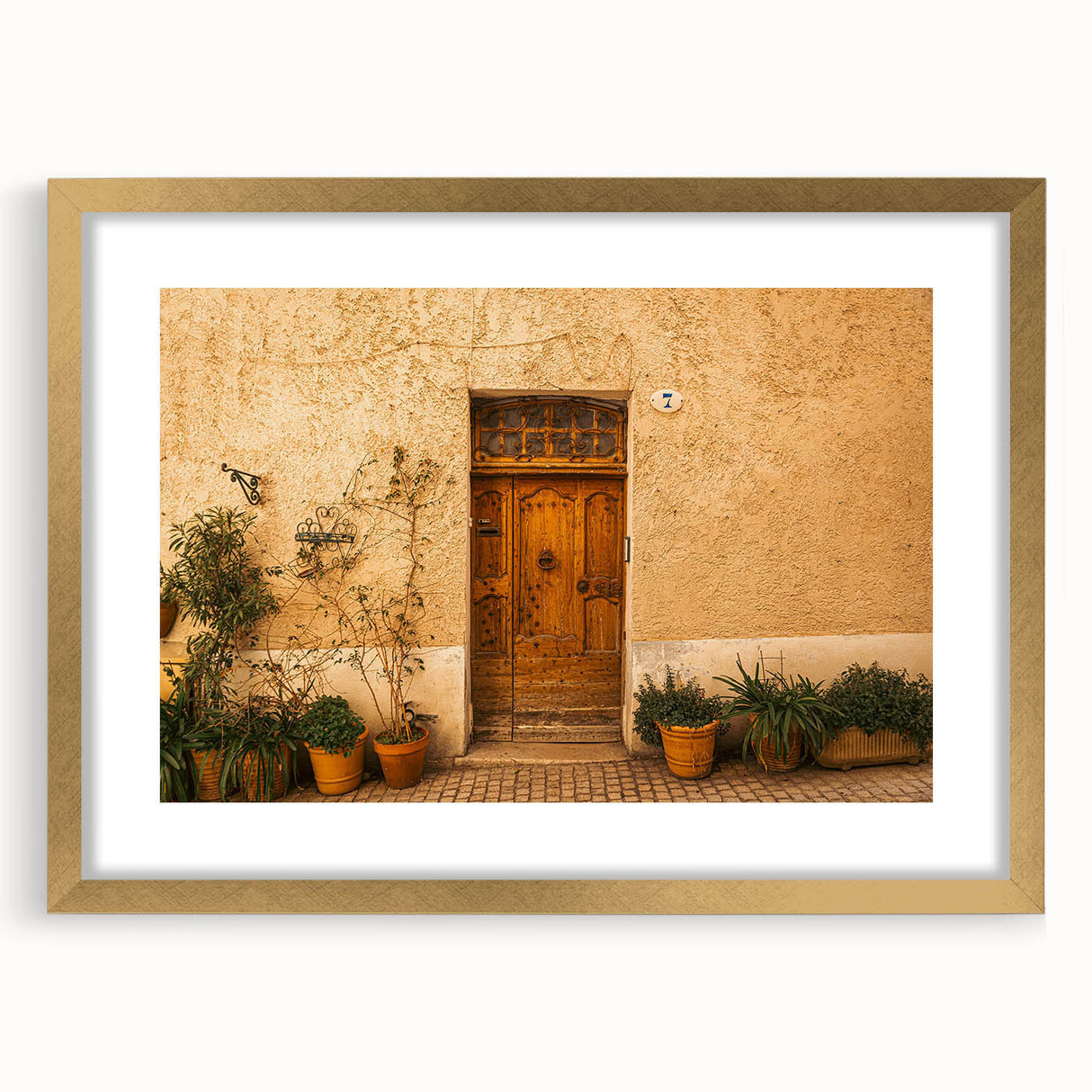 Abstract art print of Tuscany landscape in muted earth tones on a framed canvas, suitable for dining room decor.
