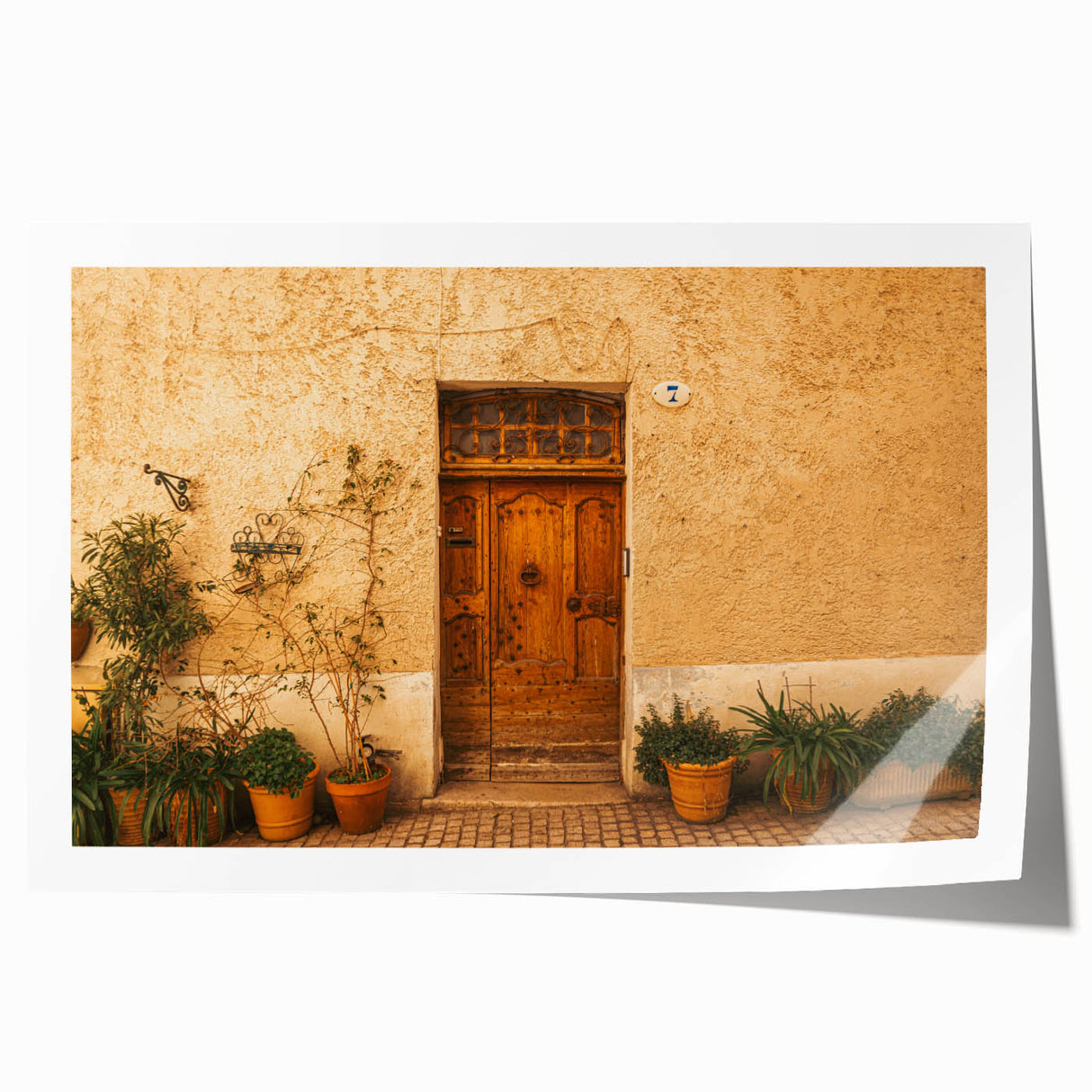 Rolled print of Tuscan landscape with vibrant green fields and a clear sky, ideal for art wall dining room.