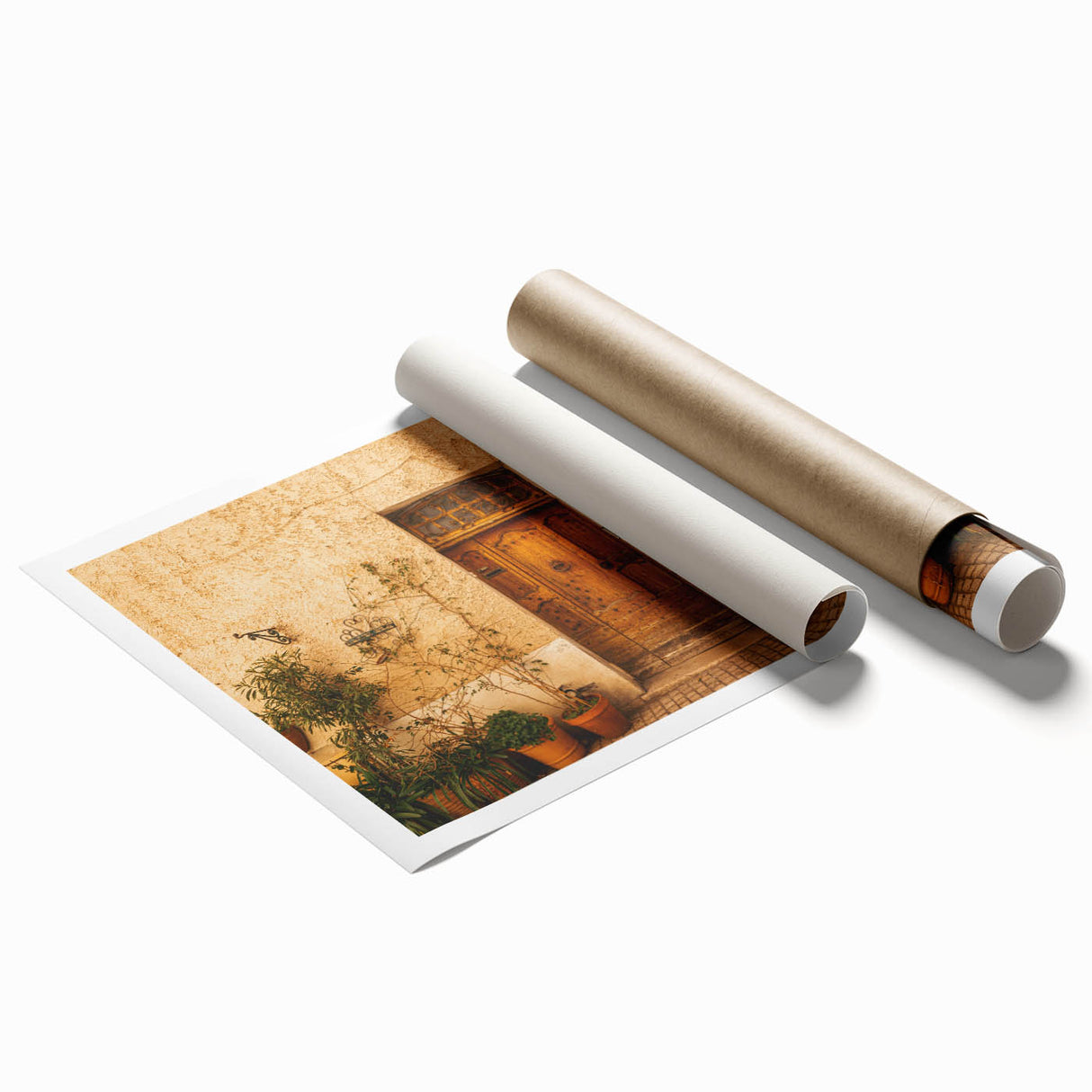 Rolled print of Tuscan landscape with lush green fields and distant hills, in muted earth tones.