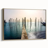 Framed canvas of a vintage-style Venice landscape in muted gold and black tones, ideal for bedroom wall art.