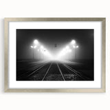 Textured abstract art print of a European landscape in muted earth tones on a silver-framed canvas.