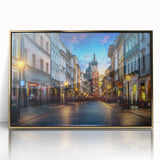 Art deco poster depicting a European cityscape in gold and black tones on framed acrylic.