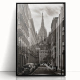 Large abstract wall art of Barcelona scenery in muted earth tones on a black framed acrylic.