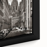 Extra large framed canvas of a textured Barcelona scenery in black with colorful accents, suited for living room decor.