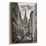 Framed canvas depicting a vintage-style Barcelona landscape in black and gold tones, ideal for bedroom wall art.